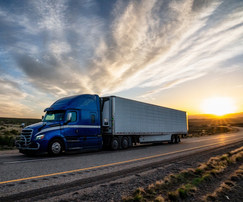 a truck is parked on the side of a road